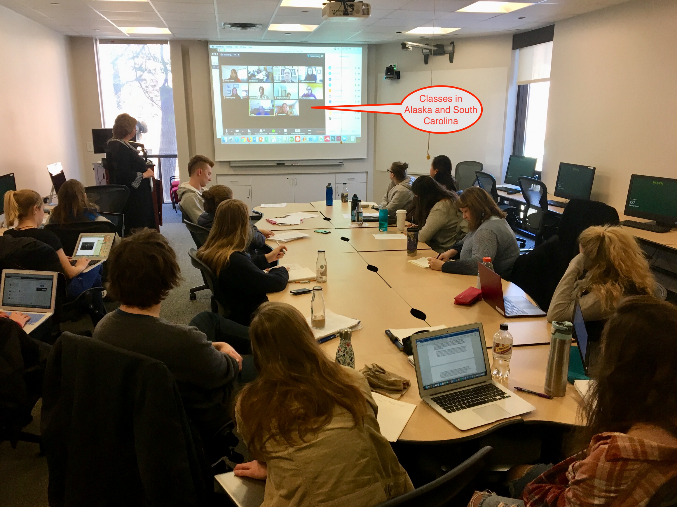 Students connect with many different parties at once, including students in Alaska and South Carolina, over video-communication in real time.